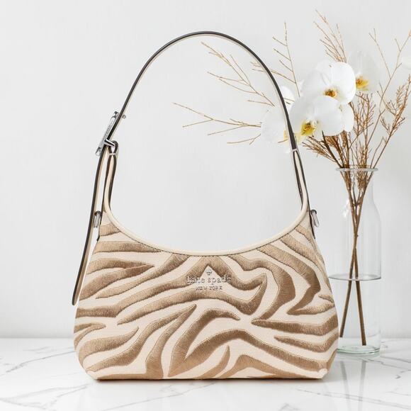 kate spade Handbags - NWT Kate Spade 454 Zebra Print Mini Crossbody Bag Neutral Multi KN589